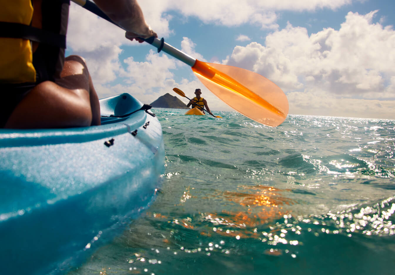 Paddling a canoe in the open sea.