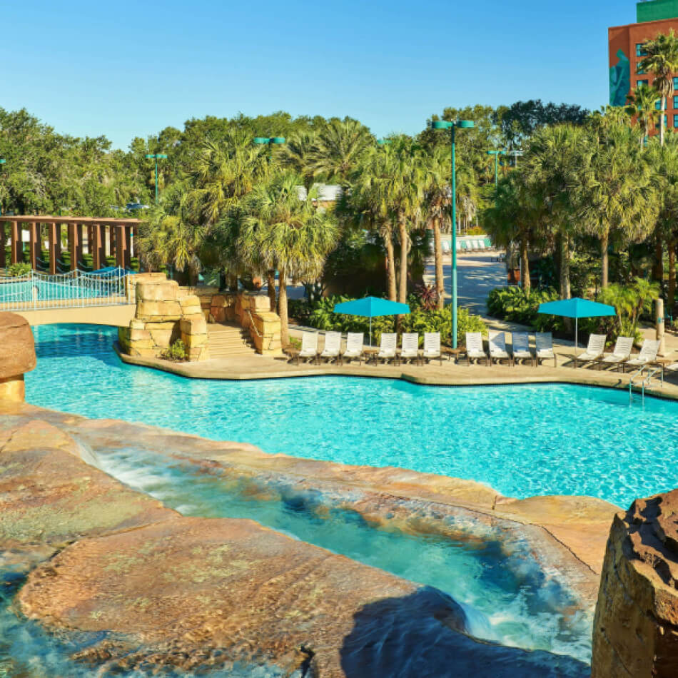 A pool side view of the Walt Disney World’s Swan and Dolphin.