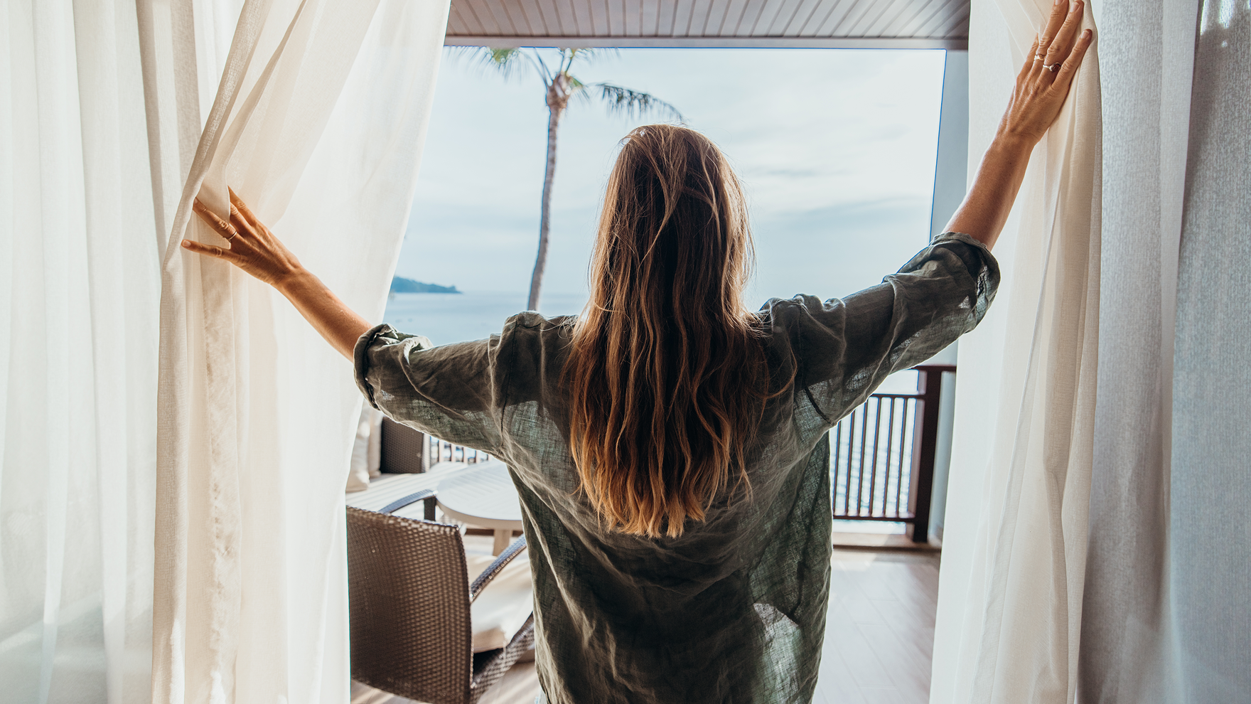 woman hotel balcony